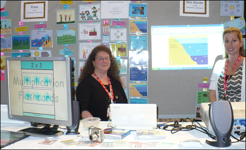 image of two amazing educators at their poster session